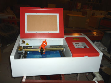 চীন Desktop Laser Engraver Co2 Laser Engraving And Cutting Machine For Carving Chapter And Artistic Works সরবরাহকারী